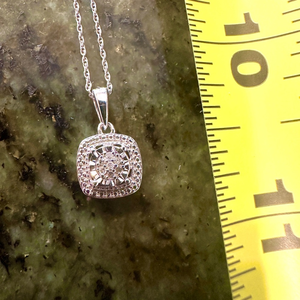Diamond pendant on sterling silver chain